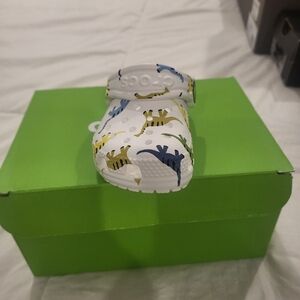 CROCS Kids' White Clogs with Dinosaur Print